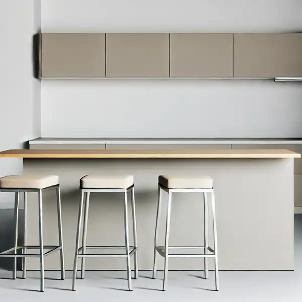 Minimalist kitchen island with seating, featuring a breakfast bar and stools that can slide under the island